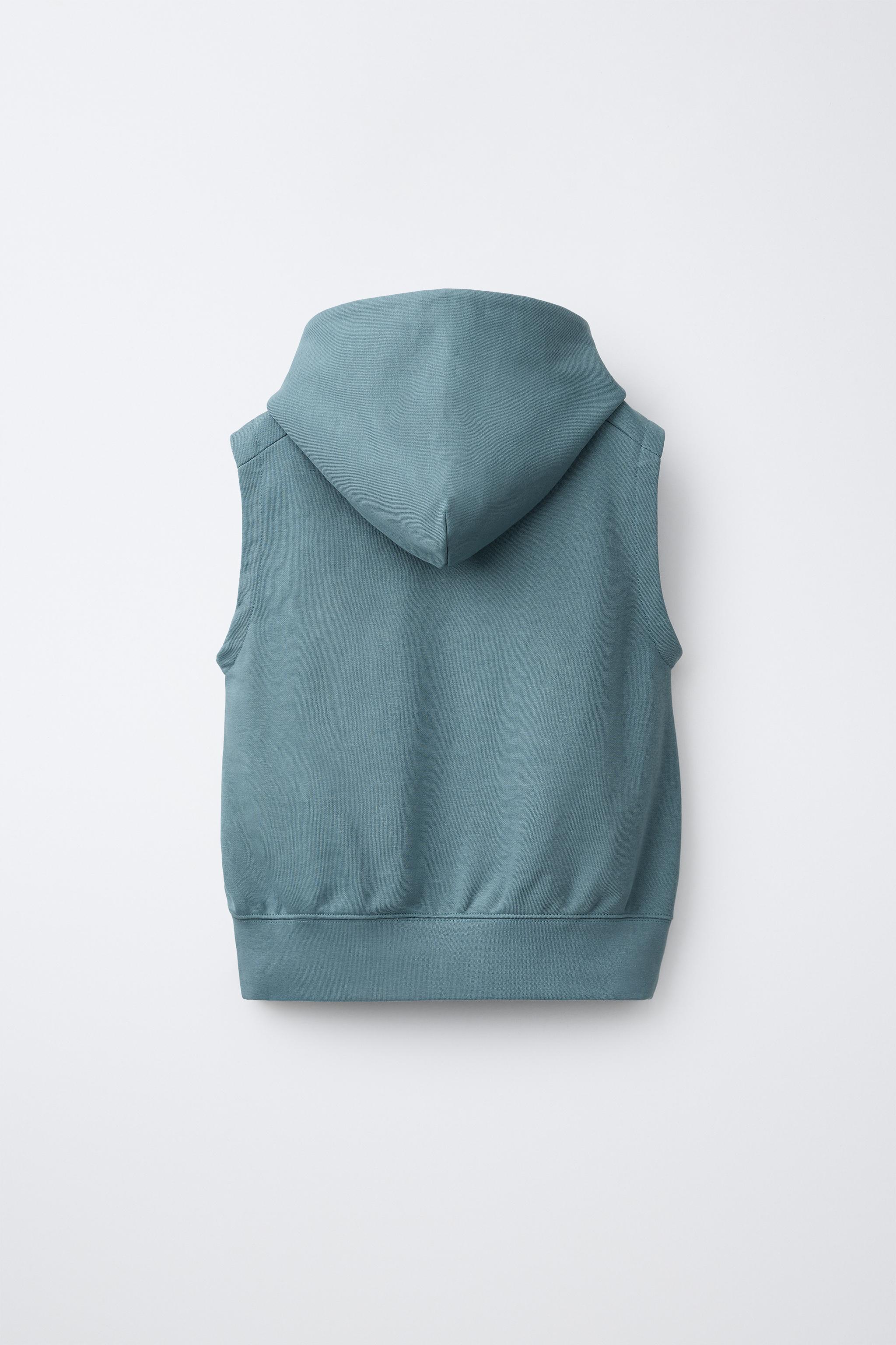 GILET À CAPUCHE EN MOLLETON IMPRIMÉ